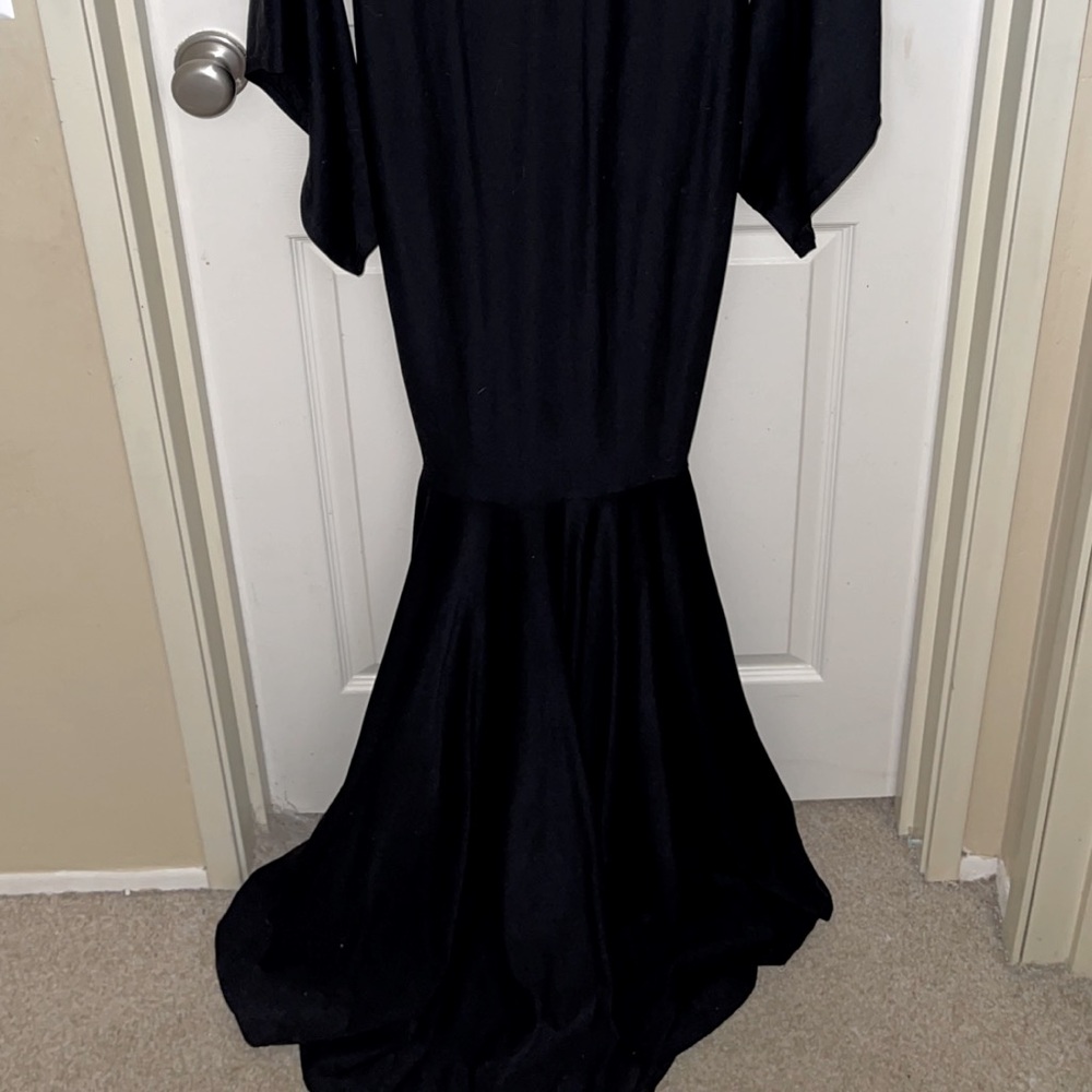 Long black slim fitting dress